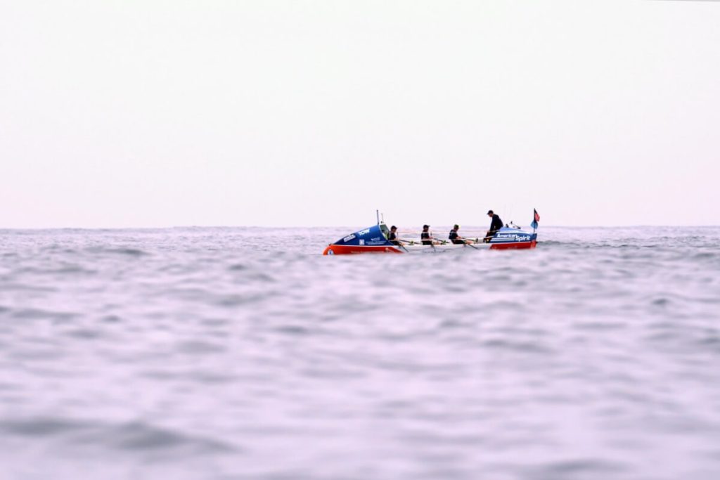 the HPP boat in the water from a distance